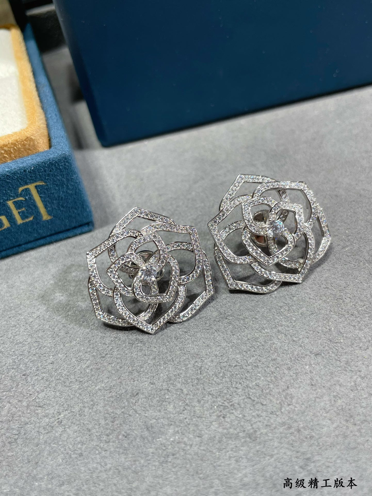 piaget fully Di*m*nd-encrusted hollow rose earrings