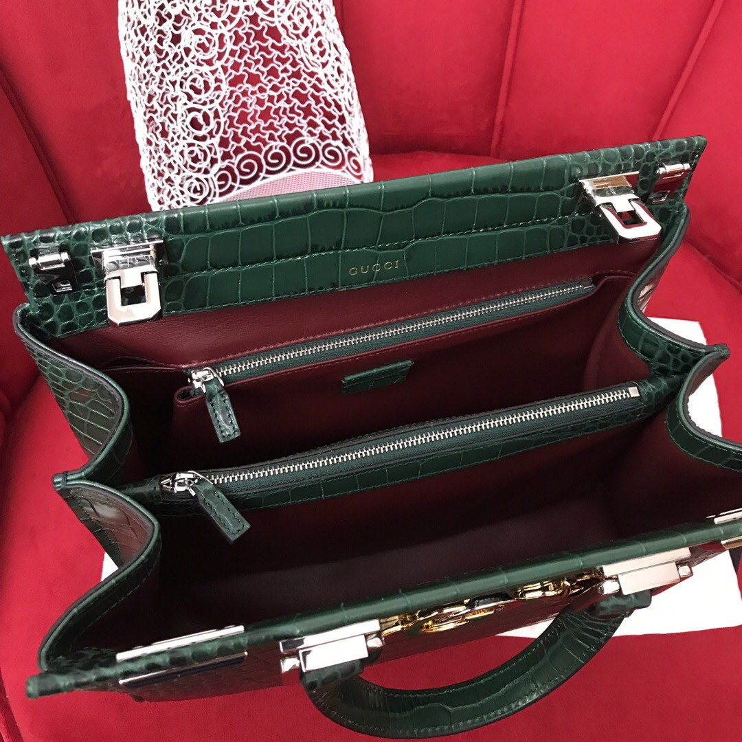 G*u*i zumi leather medium top handle bag