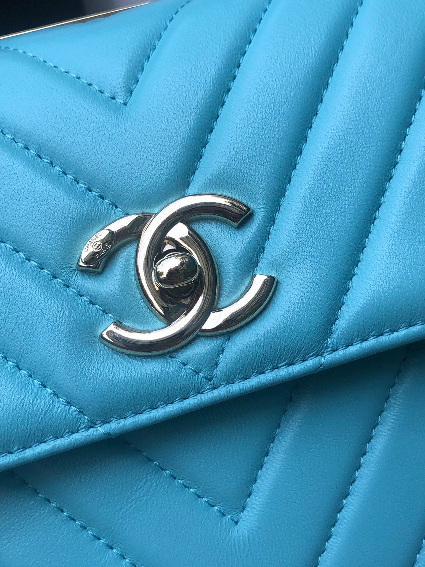 Ch*el flap bag with top handle 6.6 × 9.8 × 4.7 in