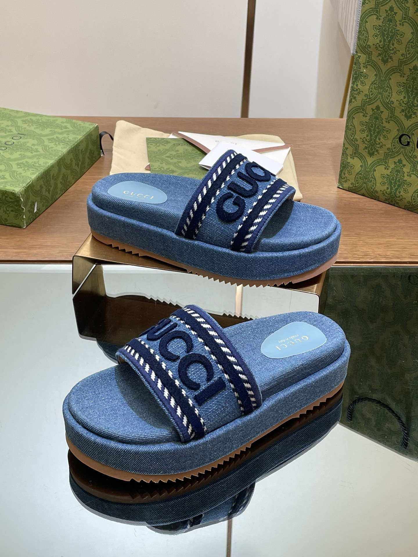 ua G*u*i slide sandal with G*u*i script